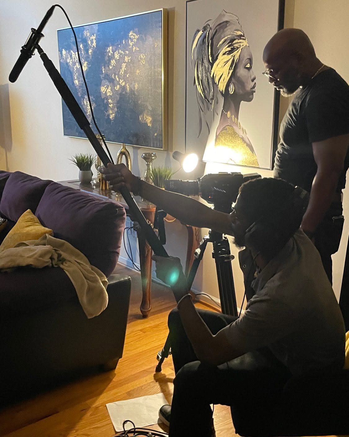 Demetris supervising a lighting and camera setup