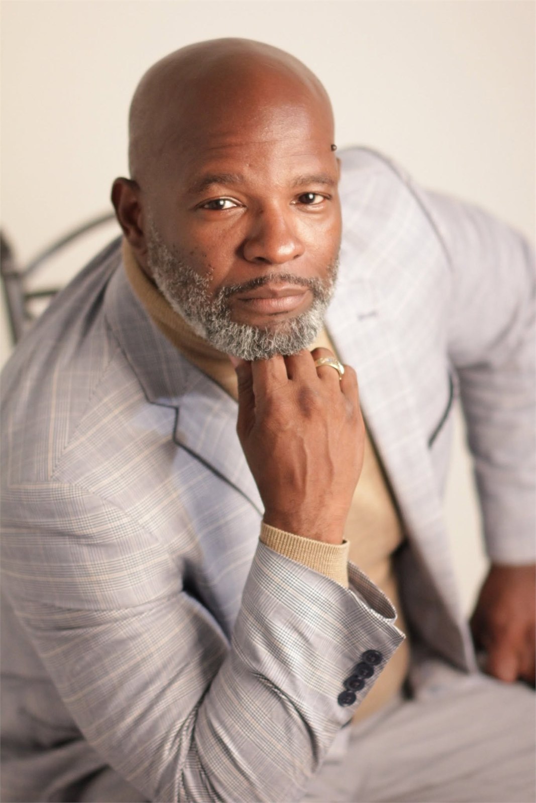 Demetris Jones in a light gray blazer